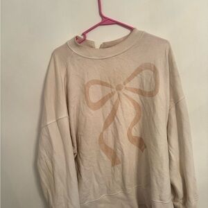 American Eagle Outfitters Cream Sweatshirt with Bow Design